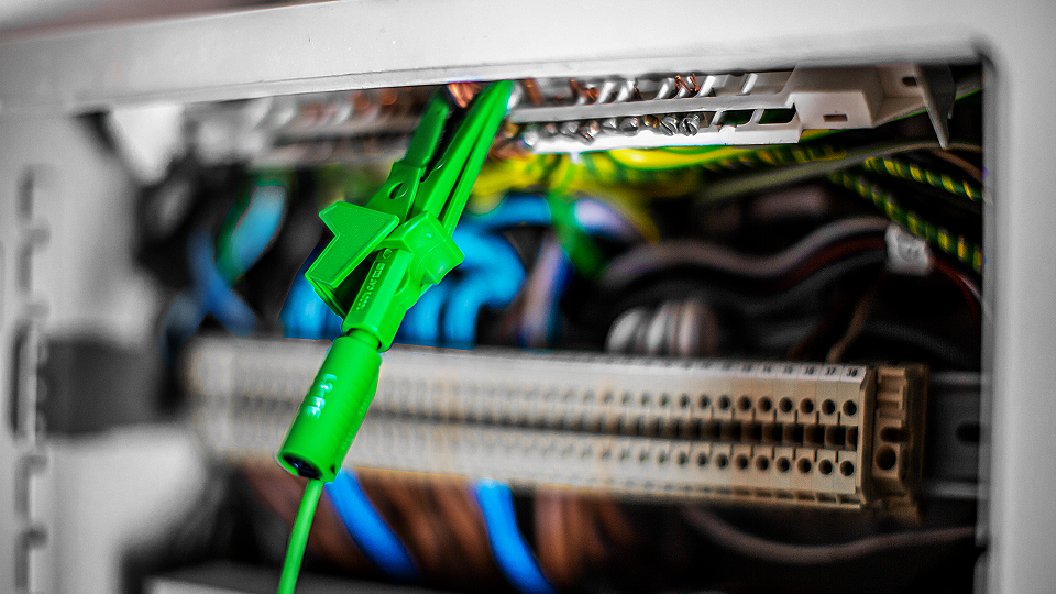 home-electrical-inspection-technician-inside-switchboard