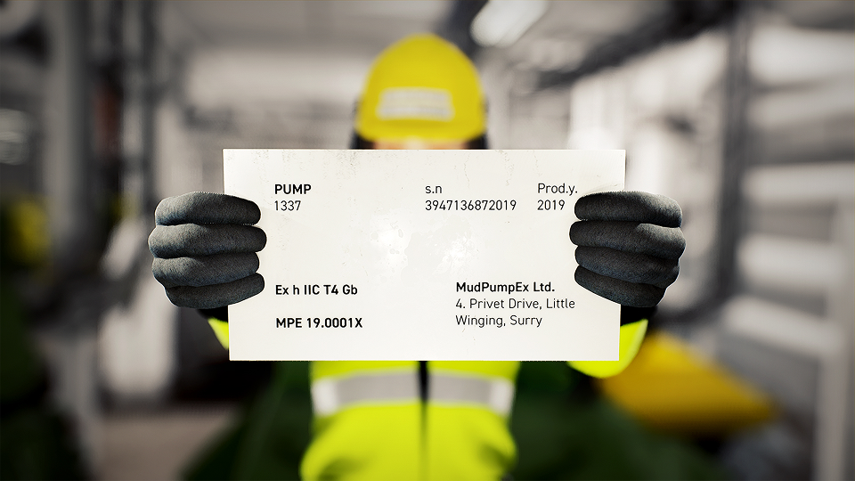 worker holding EX marking